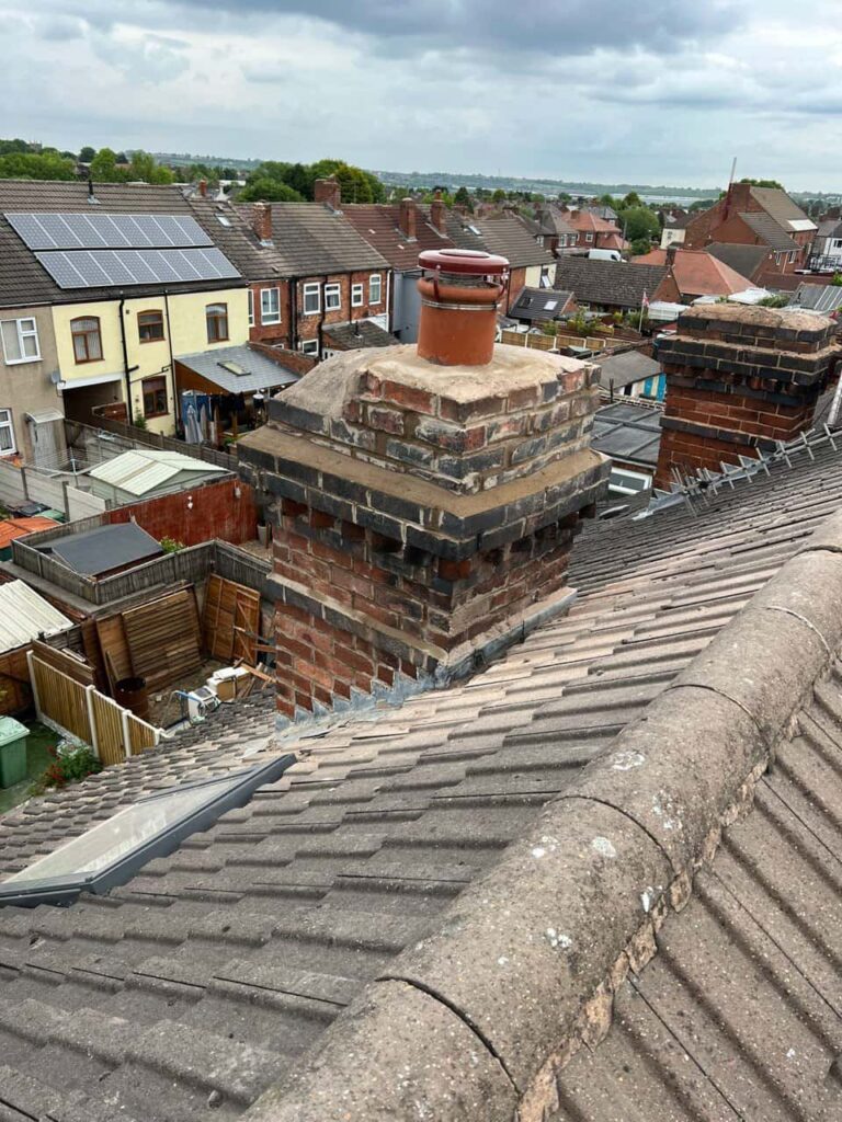 This is a photo taken from a roof which is being repaired by Ripley Roofing Repairs, it shows a street of houses, and their roofs